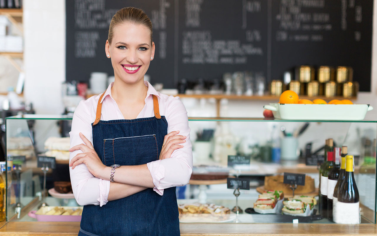 Man and woman working at coffee shop