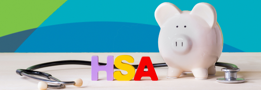 Piggy bank next to HSA letters and stethoscope
