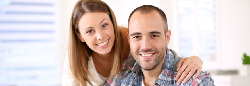 Smiling husband and wife