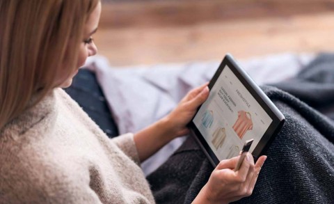 Woman shopping on her tablet