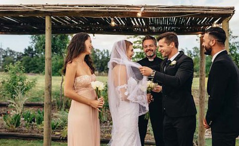 Bride and groom during an outdoor wedding